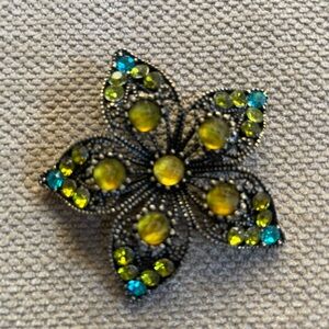 Elegant Floral Brooch with Yellow and Blue Accents